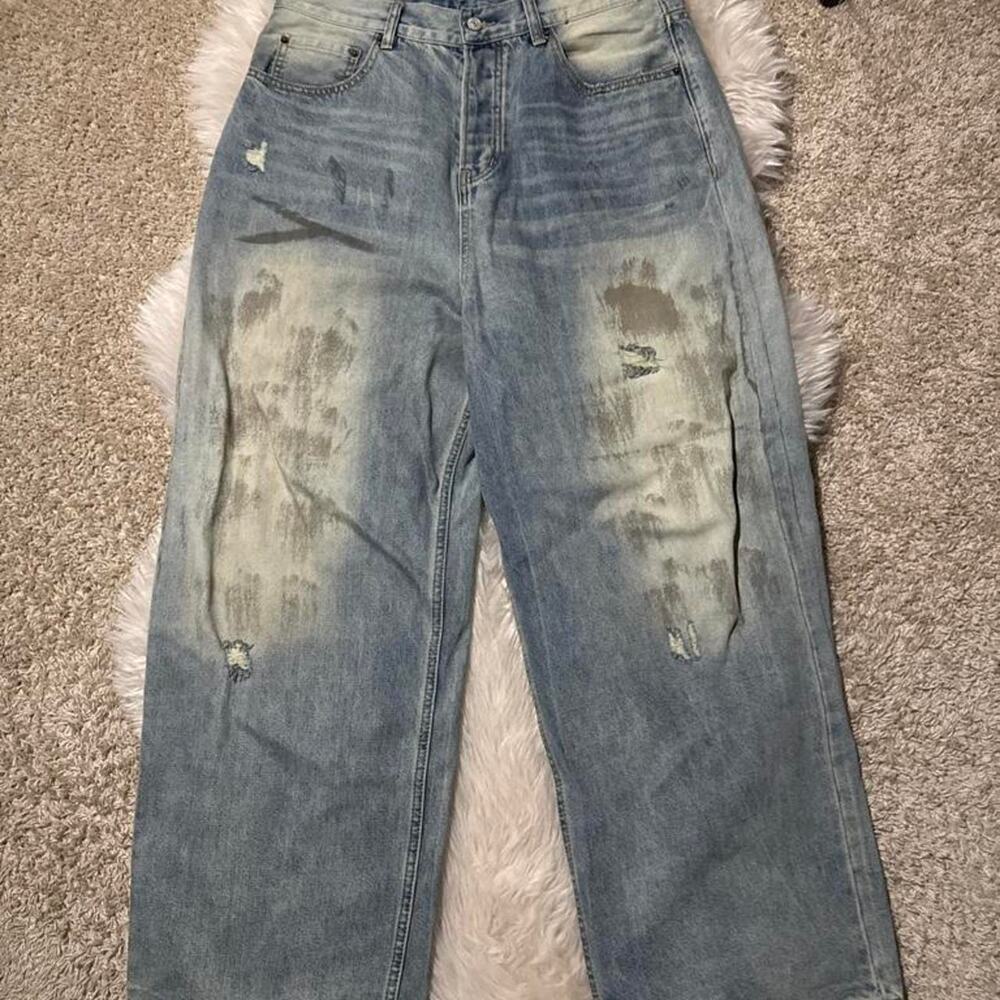 Acne ripped and distressed with